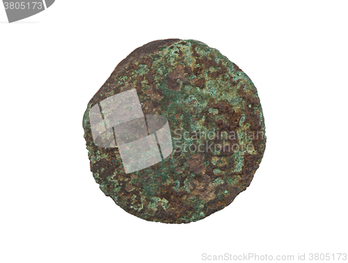 Image of Unrecognisable old coin, rusted and green, isolated