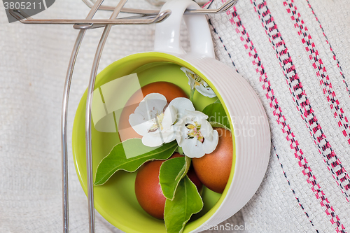 Image of Easter eggs and Apple blossoms.