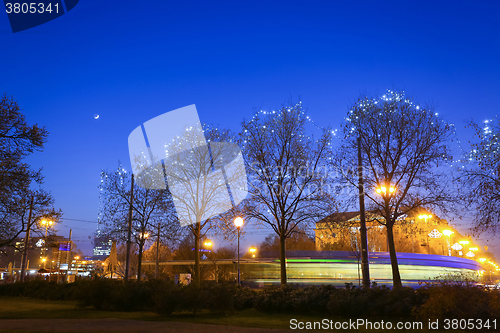 Image of Illuminated trees in city