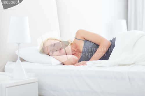 Image of Young woman sleeping.