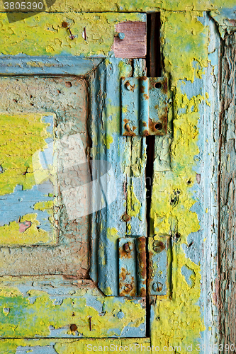 Image of green wood as a window door in  spain