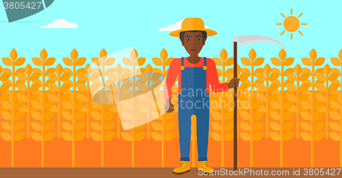 Image of Farmer on the field with scythe.