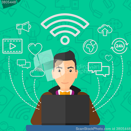Image of Man working on laptop.