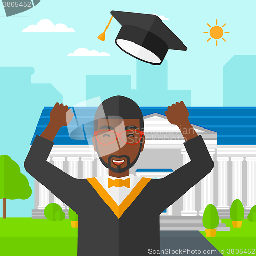 Image of Graduate throwing up his hat.