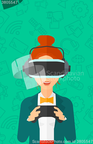 Image of Woman wearing virtual reality headset.