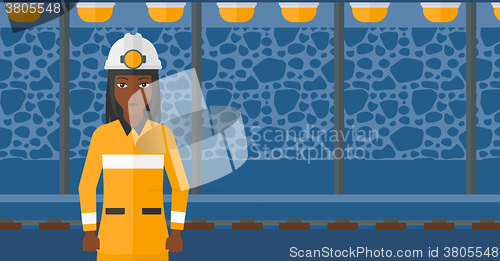 Image of Confident miner in hardhat.