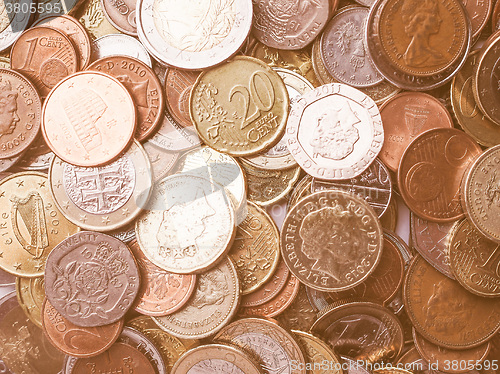 Image of  Euro and Pounds coins vintage