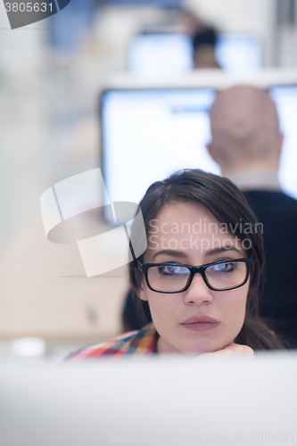 Image of startup business, woman  working on desktop computer