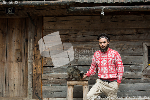 Image of portrait of man and cat