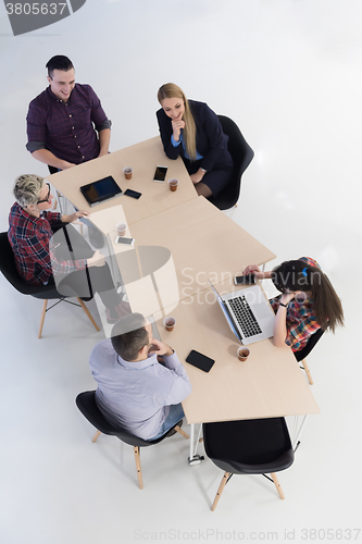Image of aerial view of business people group on meeting