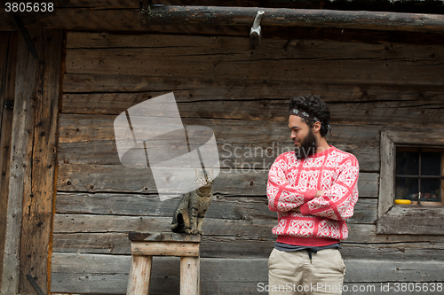 Image of portrait of man and cat