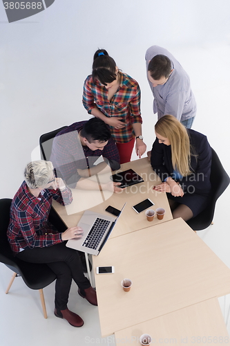 Image of aerial view of business people group on meeting