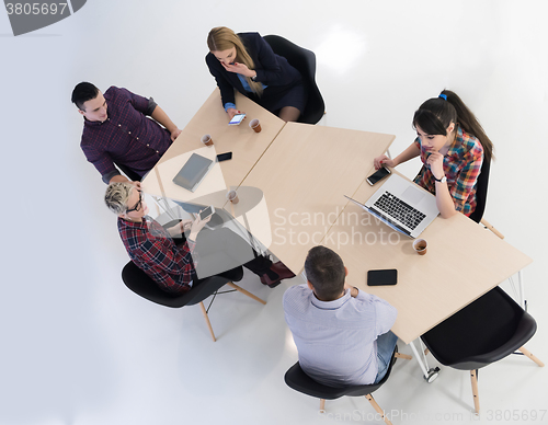 Image of aerial view of business people group on meeting