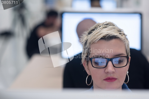 Image of startup business, woman  working on desktop computer