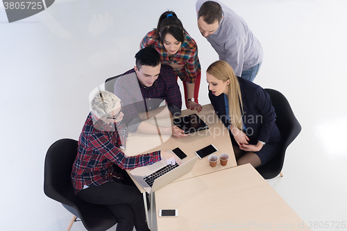 Image of aerial view of business people group on meeting