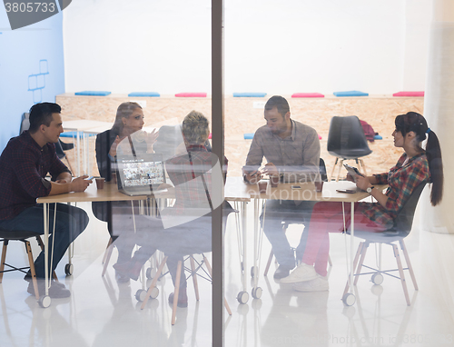 Image of startup business team on meeting at modern office