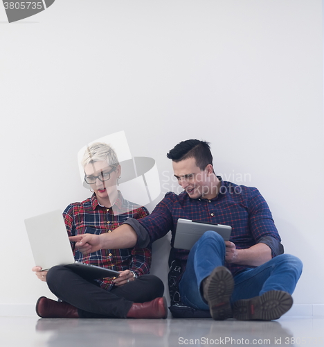 Image of startup business, couple working on laptop computer at office