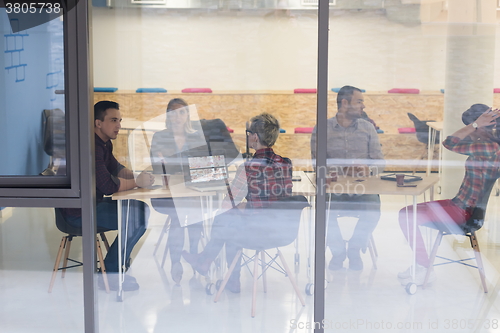 Image of startup business team on meeting at modern office