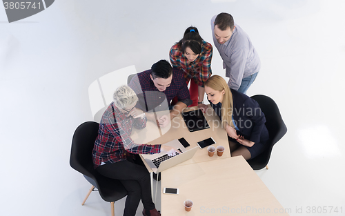 Image of aerial view of business people group on meeting