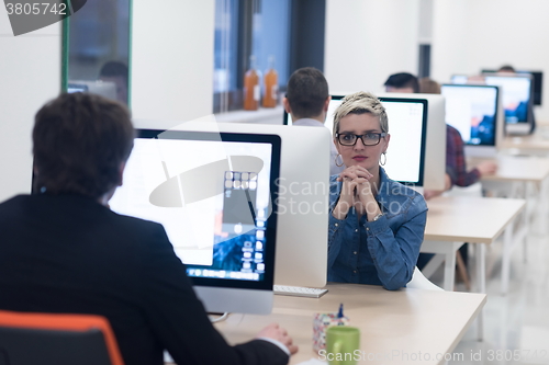 Image of startup business, woman  working on desktop computer