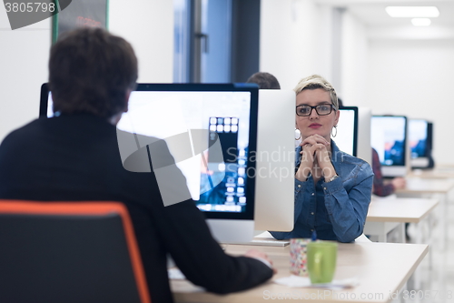 Image of startup business, woman  working on desktop computer