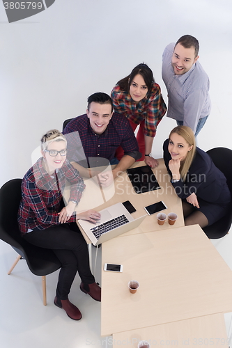 Image of aerial view of business people group on meeting