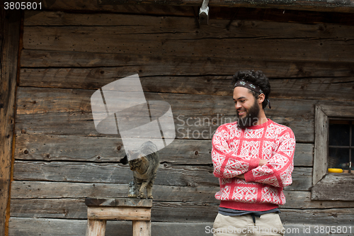 Image of portrait of man and cat