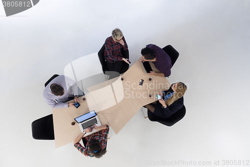 Image of aerial view of business people group on meeting