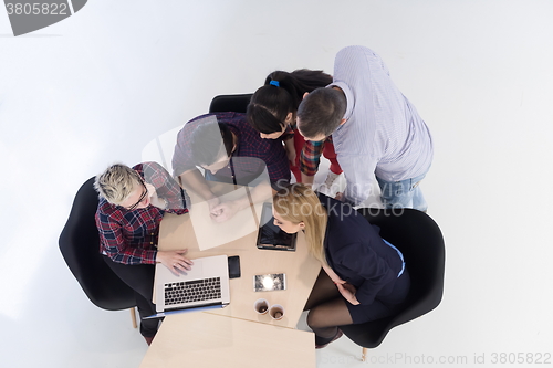 Image of aerial view of business people group on meeting