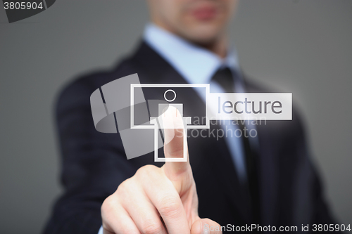 Image of technology, internet and networking concept - businessman pressing lecture button on virtual screens