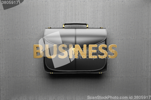 Image of Briefcase on the background of gray concrete wall. Business conc