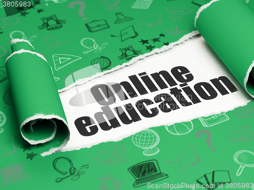 Image of Learning concept: black text Online Education under the piece of  torn paper