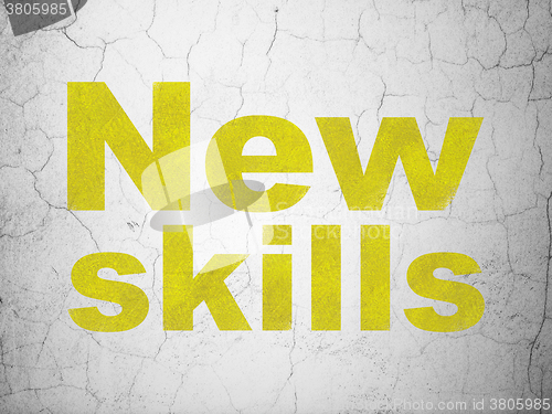 Image of Learning concept: New Skills on wall background