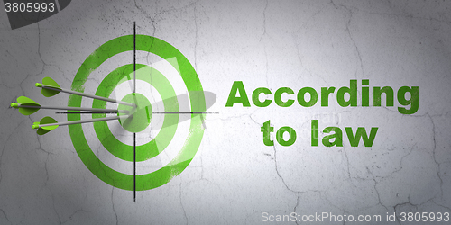 Image of Law concept: target and According To Law on wall background