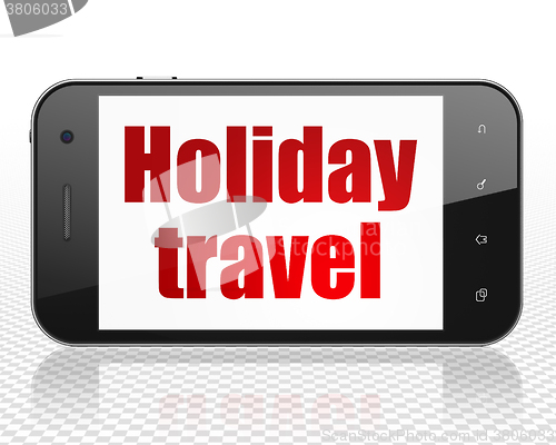 Image of Tourism concept: Smartphone with Holiday Travel on display