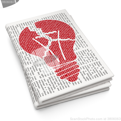 Image of Finance concept: Light Bulb on Newspaper background