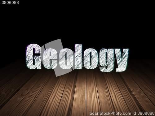 Image of Studying concept: Geology in grunge dark room