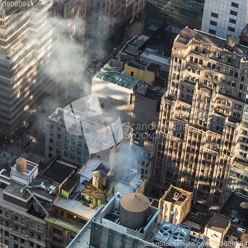 Image of New York City, Manhattan rooftops in sunrise.