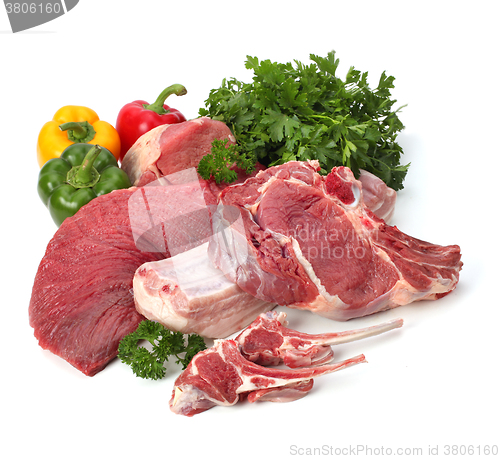Image of raw meat with vegetables