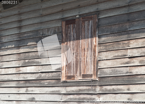 Image of wooden wall with window
