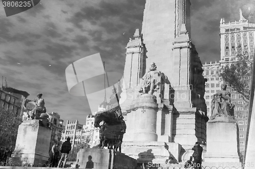 Image of  Don Quixote statue water reflection in Madrid, Spain.