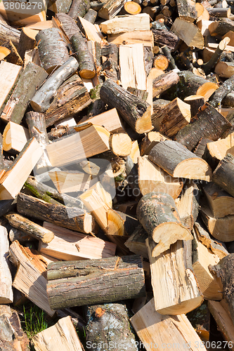 Image of Chopped firewood on a stack.