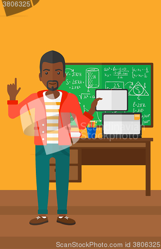 Image of Man holding tablet computer.