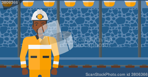 Image of Confident miner in hardhat.