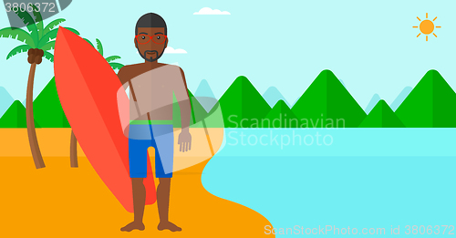 Image of Surfer holding surfboard.