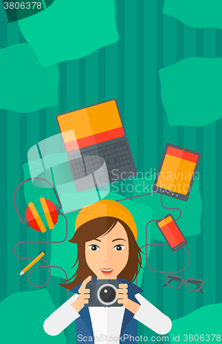 Image of Woman holding camera.
