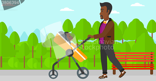 Image of Man pushing pram.