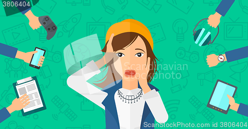 Image of Desperate woman with gadgets.