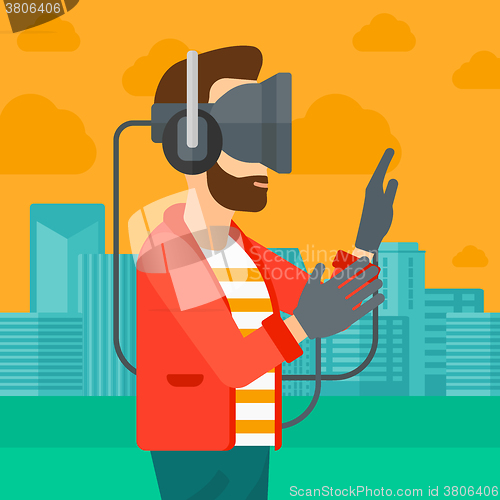 Image of Man wearing virtual reality headset.