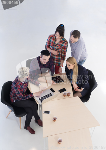 Image of aerial view of business people group on meeting
